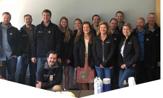 Team members posing for a photo.